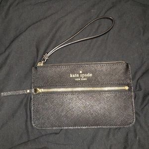 Kate spade black and gold wristlets